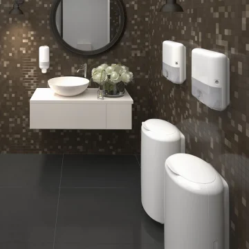 Podajalnik papirnatih brisač zloženk Tork Elevation H2 mini beli v sanitarijah