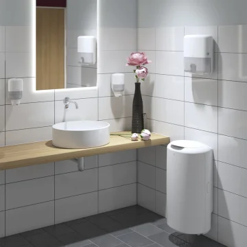 Podajalnik papirnatih brisač zloženk Tork Elevation H2 mini beli v sanitarijah